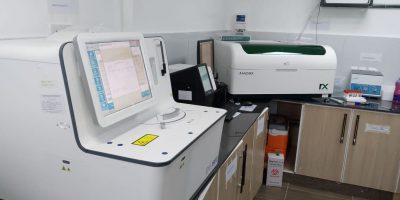 Expert team performing tests in a modern Laboratory Services facility at Light Shepherd Hospital, Kenya.