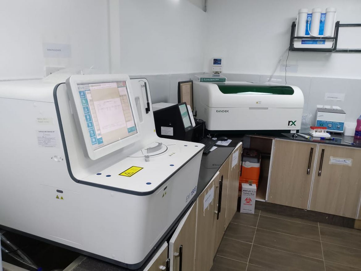 Expert team performing tests in a modern Laboratory Services facility at Light Shepherd Hospital, Kenya.